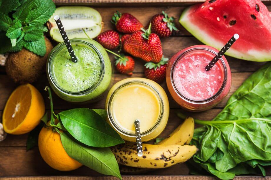 tray of fresh fruit and smoothies