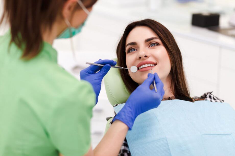 woman getting a dental exam